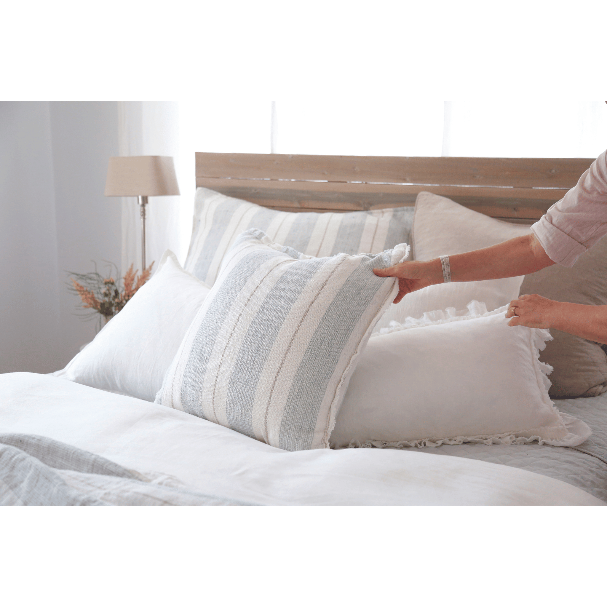 Pottery barn pom pom clearance pillow