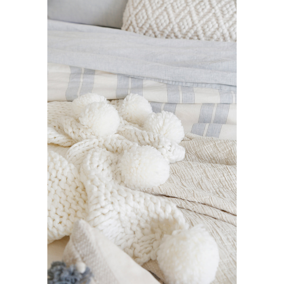 Cream throw 2024 with pom poms